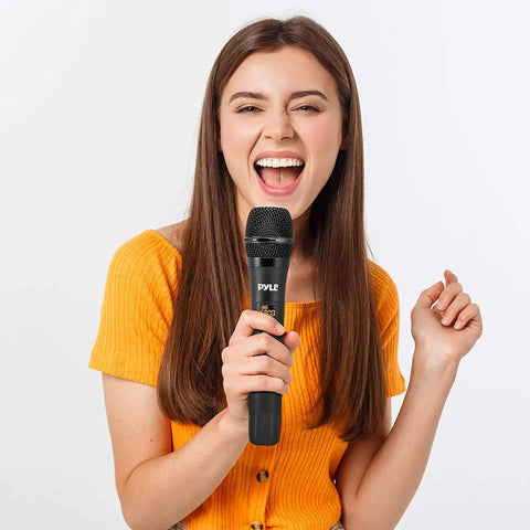 Person using Portable UHF Wireless Microphone System With Battery Power