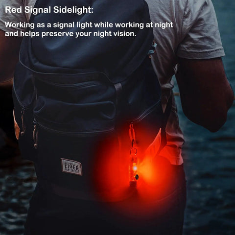 Person wearing a backpack with a Rechargeable USB C EDC Flashlight Keychain Mini Light 650 Lumens glowing red