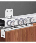 Top Shelf Bifold Sliding Barn Door Hardware Kit With Smooth Glide Soft Close Track System, heavy duty wheel track close up.
