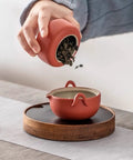 Kitchen Flex Ceramic Tea Canisters With Airtight Wooden Lids Lock In Moisture And Keep Your Coffee Hella Fresh Daily Stylish Porcelain Food Storage Jars Amazing For Pantry Organization Sets Of Four Crafted Well, red canister pouring tea leaves.