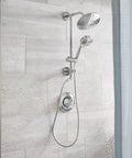 Chrome Replacement Handheld Showerhead With Four Function Eco Performance WaterSense Certified installed in bathroom setting
