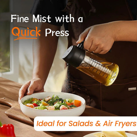 Game Changing Glass Olive Oil Sprayer For Cooking, 16 Oz dual pump dispenser bottle spraying fine mist on salad.