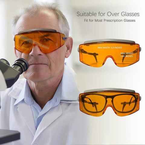 Top Shelf Laser Safety Glasses With Od6 Plus Uv400 Filter For Tattoo And Pmu Removal Techs, clear orange goggles fitting over prescription glasses.