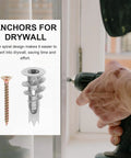 Hand using 20 Piece Drywall Anchor Kit With Self Drilling Screws And Self Tapping Fasteners on a wall