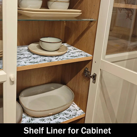 Top Shelf Non Adhesive Shelf Liners For Pantries Drawers And Closets With Nonslip Texture Durable Material Easy To Trim And Slide Into Place Every Single Time No Fuss Home Setup Game Changer in a cabinet with dishes.