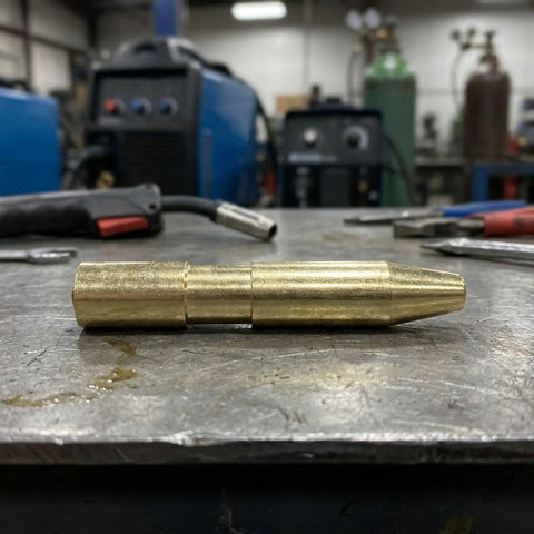 Premium Dual Size V Groove Drive Roll Kit With.030 And.035 Mig Welder Wire Feeder Gears resting on a metal surface.