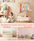 Heavy Duty Toddler Clothes Rack Featuring Open Storage Shelf Ideal For Kids Dress Up Costumes with colorful clothes and toys.