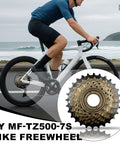 Cyclist on road bike with 7 Speed Screw On Freewheel For Bikes TZ500-7 14-28 Tooth Gears Durable Steel Cogs inset view