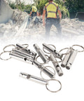 Versatile Emergency Whistle Kit 10 Pack Alloy Safety Whistles With Keychains scattered on debris background