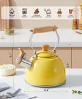Yellow 1.6 Quart Tea Kettle With Cool Touch Wooden Handle Food Grade Stainless Steel Stovetop Teapot Whistling Kettle For Easy Pour Ergonomic Grip Safe Heat Resistant Kitchen Accessory on kitchen counter.