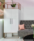 Stylish room with modern white cabinet featuring matte black 10 inch square cabinet pulls for kitchen cabinets and drawers.