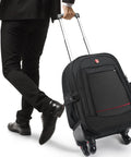 Rolling backpack side view: black Amazon wheeled luggage with retractable handle and four wheels.