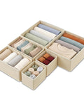 Kick Clutter To The Curb With This Slick Foldable Drawer Organizer Set Of Six Beige Fabric Compartments keeping rolled clothes tidy.
