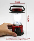 Hand holding red Battery Powered LED Lantern With Variable Power For Camping Dimmable COB LED Light With measurement guide