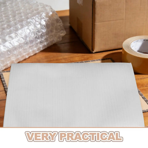 No Sweat Moving Heavy Duty Epe Foam Cushioning Pouches For Moving And Shipping 100 Pieces weather proof packing bags laid on a wooden table.