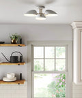 Jace Flush Mount Ceiling Light With Vintage Gold Brass Frame And Linen Shade in a kitchen setting, delivering cozy vibe.