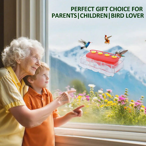 Window Hummingbird Feeder With Strong Suction Cup No Fuss 10oz Red Outdoor Bird Feeder With Built In Moat Easy To Clean And Refill Clear View For Up Close Bird Watching Perfect For Gardens And Porches attached to window with birds feeding, elderly woman and child watching.