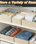 Kick Clutter To The Curb With This Slick Foldable Drawer Organizer Set Of Six Beige Fabric Compartments stacked with clothing.