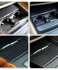 Hella Durable Center Console Cup Holder Slide Cover Featuring Slick Gliding Roller Blind Shutters For BMW X5 And X6 Models showing two-piece black slider trays in vehicle's interior.