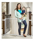 Woman holding child next to Extra Wide 29 To 43 Inch Walk Through Baby Gate For Stairs With Hardware Mount Banister And Wall Mount Kit.