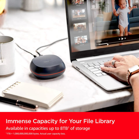 Massive 8TB External SSD Desk Drive With USB-C And USB 3.2 Gen 2 on desk near laptop for creative work