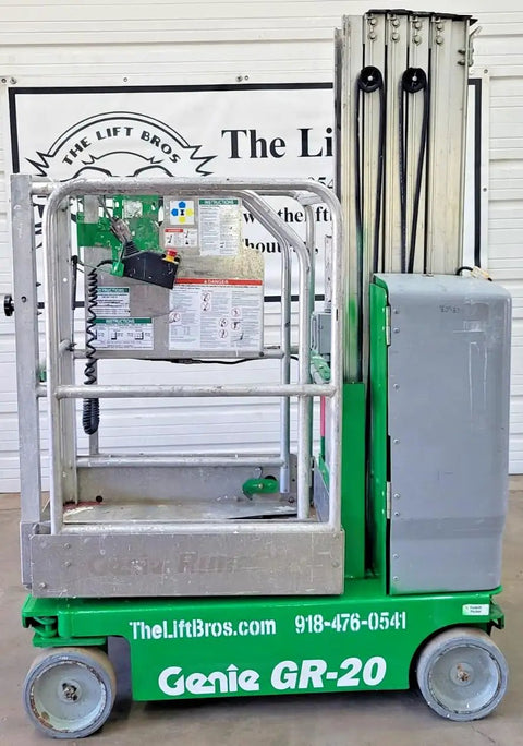 2016 Compact Self Propelled Electric Vertical Mast Lift Featuring Slick Drivability At Full Height Smooth Handling Verified Low Hours And Rock Solid Build Quality Ready To Crush Any Job Site Task. Genie GR-20 model with control panel.