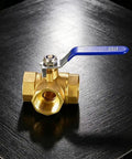 Built Tough Forged Brass Three Way Valve T Type Half Inch Bsp Thread Heavy Duty Plumbing Connector on a black surface.