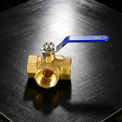 Built Tough Forged Brass Three Way Valve T Type Half Inch Bsp Thread Heavy Duty Plumbing Connector on a black surface.