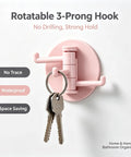 No Drill Rotatable 3 Prong Wall Hook With Insane Adhesive Hold For Durable Key Towel Bag Storage Waterproof Swiveler Perfect For Bath Kitchen Gear Organization And Quick Access, pink, mounted with keys.