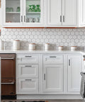Kitchen with white cabinets featuring 10 Pack Matte Black Cabinet Handles 4 Inch Center To Center, durable and rust resistant.