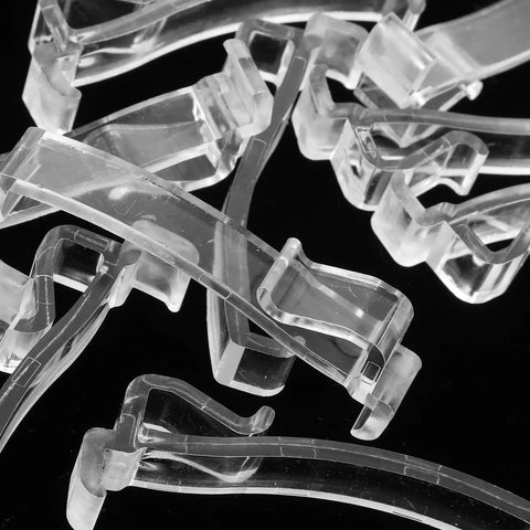 Thirty Piece Set Of Transparent Valance Clips For Window Blinds 2.5 Inch Hidden Track Holders showing clear plastic clips for easy installation.