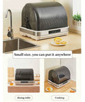 Savage Clean 42L Portable Desktop Tableware Sanitizer Cabinet With Four Speed UV Drying And Hot Air Cycle For Kitchen Countertop Keeps Dishes Crisp No Cap on kitchen countertop with stacked plates and lemons.