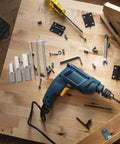 Power drill on workbench with screws, 24 Piece Toggle Bolt Kit For Drywall With Wing Nuts And Boxed Set visible, for DIY projects.