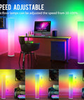 Two Pack RGB Floor Lamps With Music Sync App Control And Time Settings Dimmable Color Changing Standing Lamps illuminating a workspace.