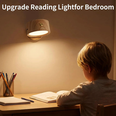 Child reading under USB Rechargeable Wall Light Set Two Pack With 360 Degree Rotating Magnetic Heads Adjustable Sconce Lighting Featuring Three Color Temperatures and Stepless Dimming Remote Control For Bedroom Hallway Bedside.