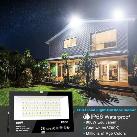 Next Level Smart Bluetooth Led Flood Light With App Control 80 Watt 800W Equivalent illuminating a modern home garden at night.