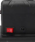 Close-up of Cordless Mini Bench Grinder 3 Inch With Variable Speed 2000 To 6000 RPM power switch and grinding wheel.