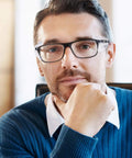 Flexible Slip On Side Shields For Clear Prescription Eyeglasses With Soft TPU Cushions on a man with a thoughtful expression.