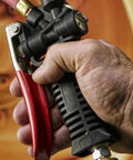 Hand holding Pro Digital Tire Inflator With Gauge And Backlit 0.1 Display, 36 Inch Hose, Ball Foot Air Chuck With Clip