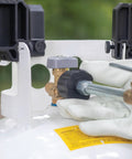 Close-up of One Pound Propane Refill Kit for Refillable Tank No Fuss Fast Sixty Second Refill with stabilizing feet attached to propane tank.
