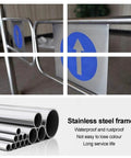 Heavy Duty Automatic Rebound Swing Gate Built Tough With Smooth Rolling Springs close-up of stainless steel frame and directional sign.