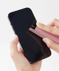 Touchscreen Mist Cleaner Kit With Spray And Wipe Pink Pocket Size cleaning iPhone screen.