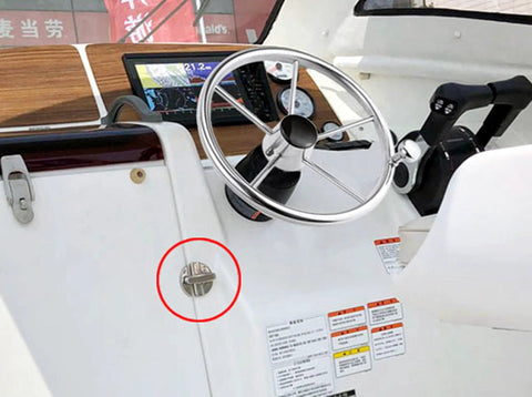 Stainless Steel 316 Marine Grade Twist Lock Round Door Catch on yacht helm, 55mm diameter, rust resistant, heavy duty fastener.