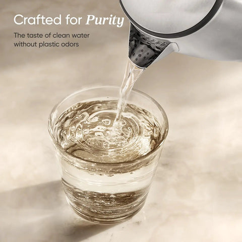 Plastic Free Interior Electric Kettle With 304 Stainless Steel, Easy To Clean, Auto Shutoff pours water into a glass