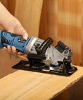 Badass Cordless Mini Circular Saw Featuring 4-1/2-Inch Pure Copper Motor and Integrated Laser Guide for Clean Cuts in use on wood.