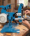 Heavy Duty Vertical Horizontal Belt Sander And Benchtop Grinding Polishing Machine With 1100W Motor, blue frame in workshop, sanding wooden piece.