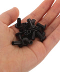 Black Furniture Connector Bolts And Barrel Nuts 40 Piece Kit For Rock Solid Bed Frame And Cupboard Assembly showing bolts in hand