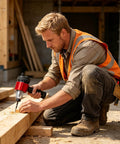 Worker using Rivet Nut Adapter Kit For Cordless Drill, Quick-Change Blind Riveter Insert on wood project site, red in color