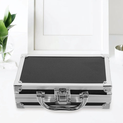 Heavy Duty Metal Briefcase Toolbox With Rugged Handle And Smart Compartments Built Solid For On The Go Handymen Fixing Cars Or Stashing Daily Gear, top view showing black case with silver accents.