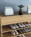Ten Tier Stackable Shoe Rack With Top Storage Bin Vertical Narrow Shoe Organizer For Entryway Closet Lightweight Yet Heavy Duty with shoes and a bag.